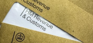 HMRC tax letters. Brown HMRC envelopes. An envelope from the UK tax office HM Revenue and Customs.