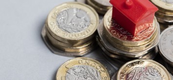 Red House with pound coins