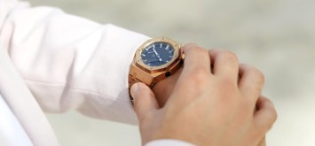 Man looking at his watch