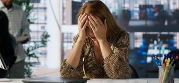 Women stressed over business struggling financially.