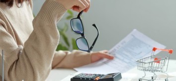 Sad Woman doing finances
