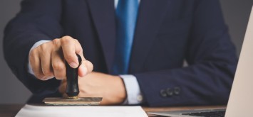 Businessman rejecting a document