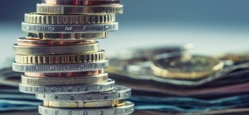 Pound coins stacked