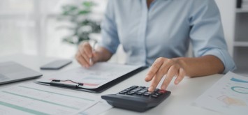 Businesswoman looking at finances