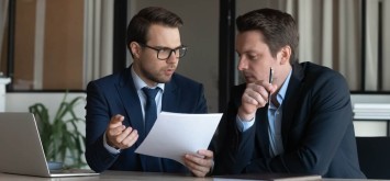 Two men in discussion