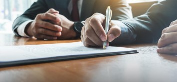 Businessman signing a contract