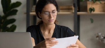 Women reading important papers.