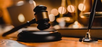 Gavel hammer in court courtroom for crime judgement legislation and judicial decision.