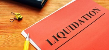The word liquidation is printed on the red page.